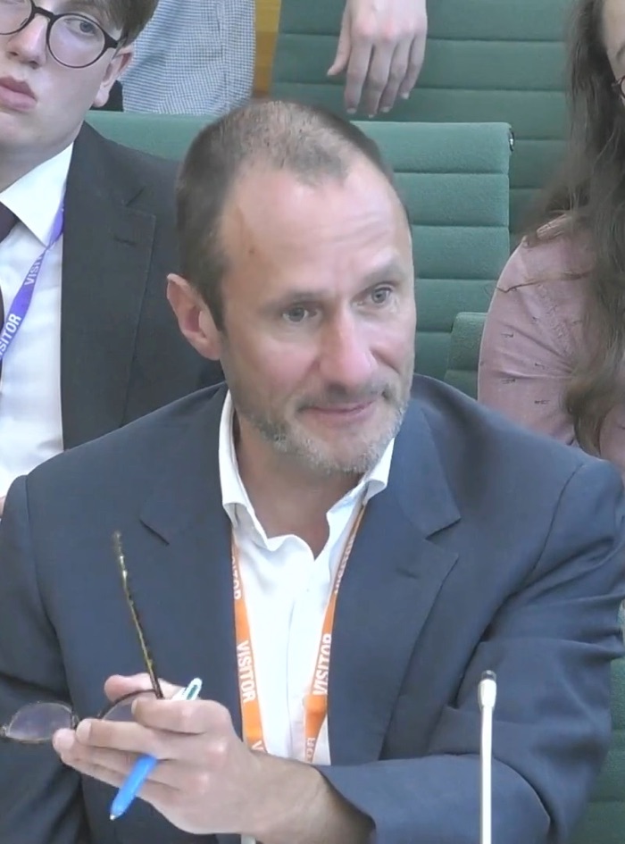 Kester Brewin giving evidence in Parliament